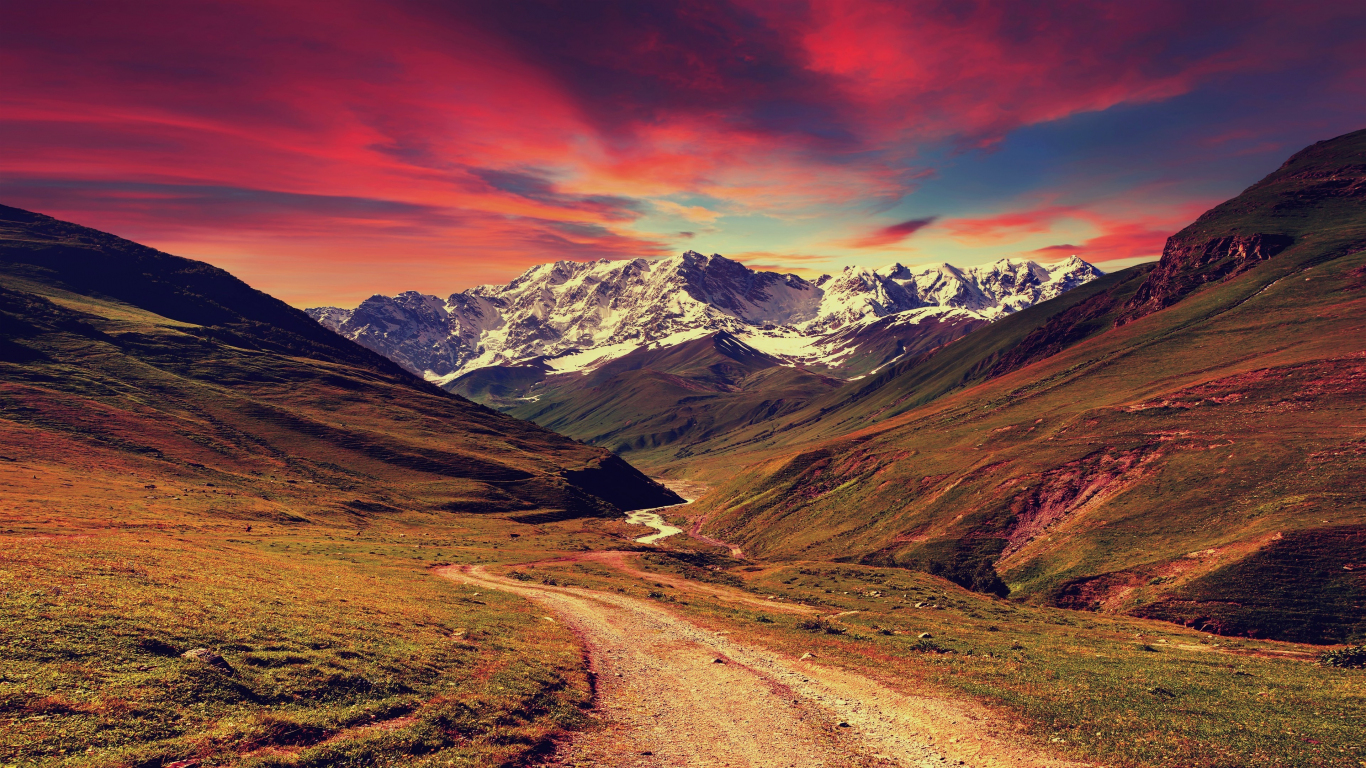 Download 1366x768 wallpaper mountains, sunset, landscape, tablet