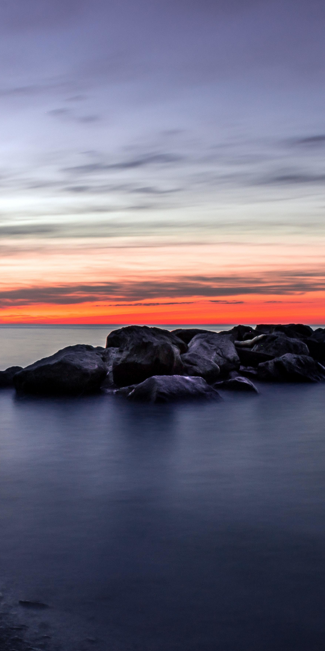 Rocks, sunset, coast, nature, 1080x2160 wallpaper