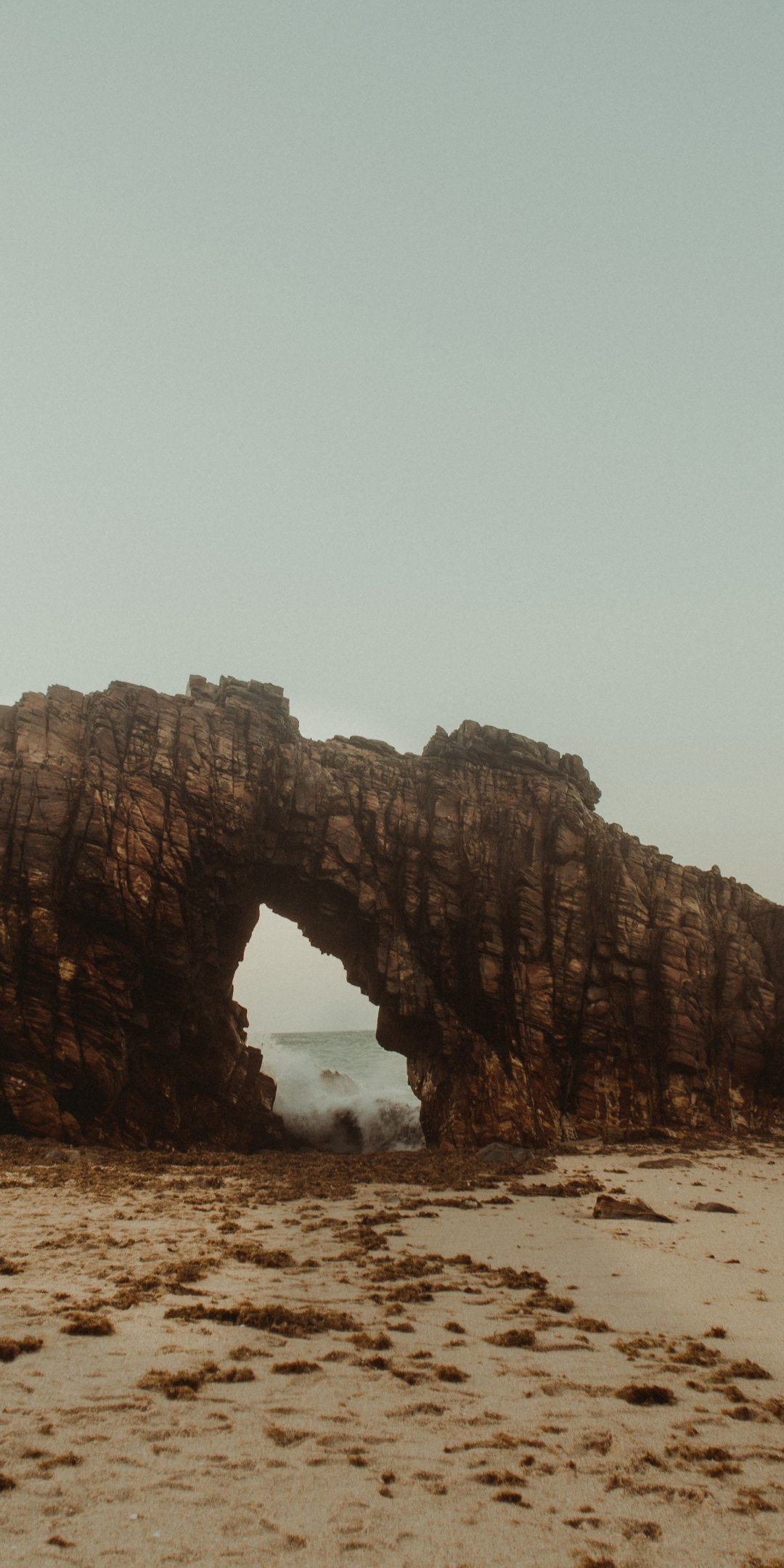 Rocks, arch, coast, beach, 1080x2160 wallpaper