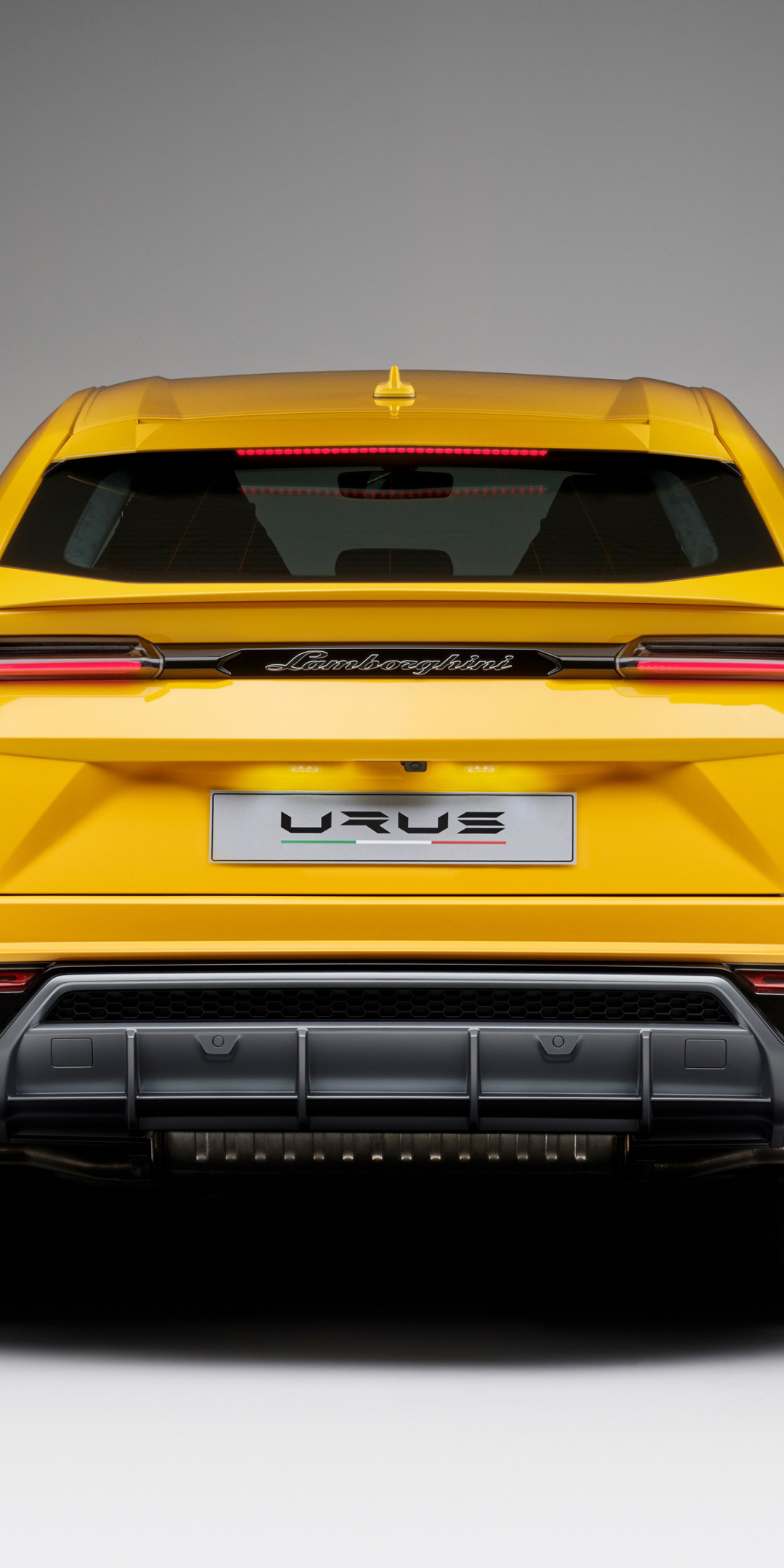 Lamborghini urus, yellow car, rear view, 1080x2160 wallpaper