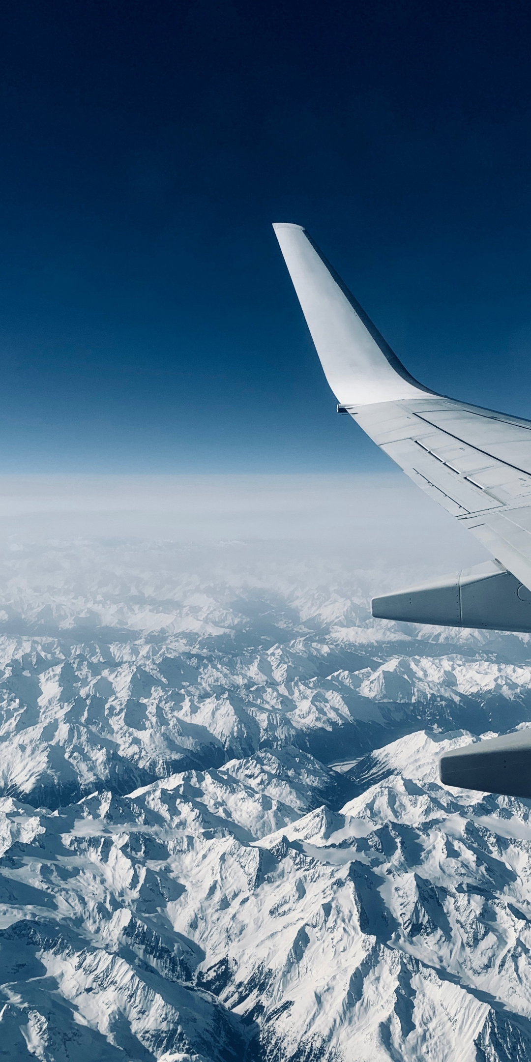 Airplane, wing, clouds, mountains, aerial view, 1080x2160 wallpaper