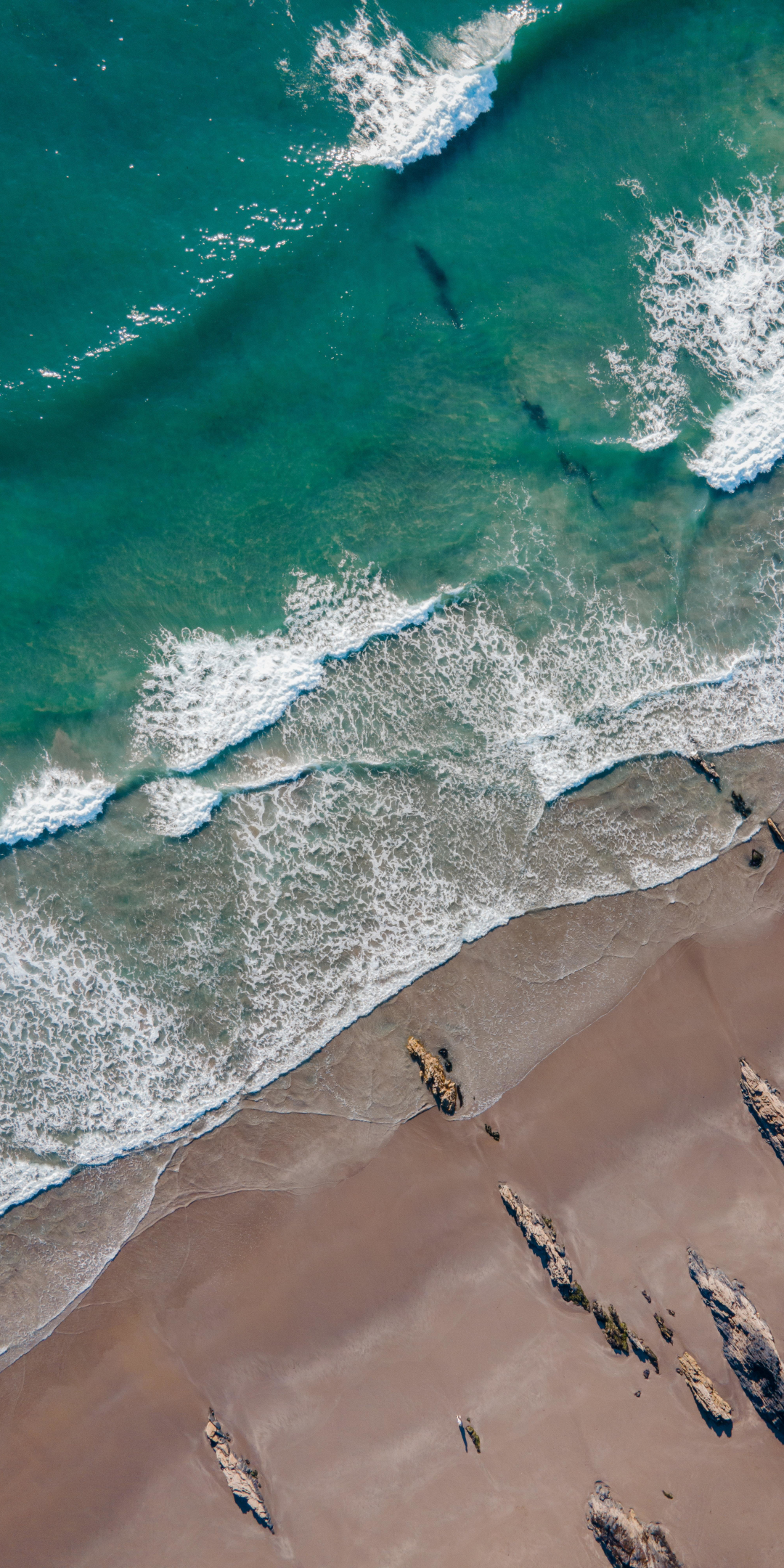 Calm beach, waves, rocks, green sea in summer, 1080x2160 wallpaper