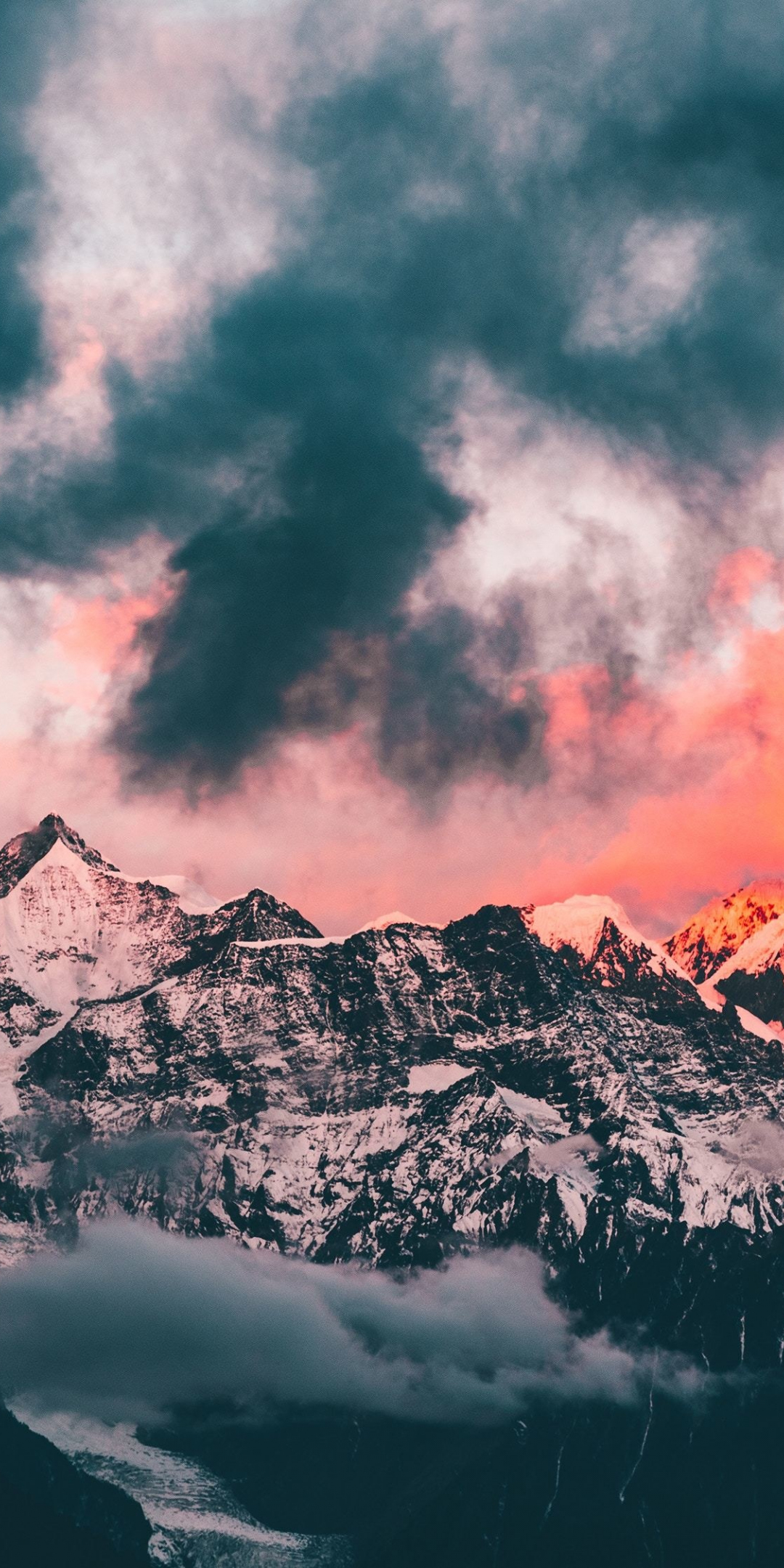 Clouds, sunset, glowing peaks, mountains, 1080x2160 wallpaper