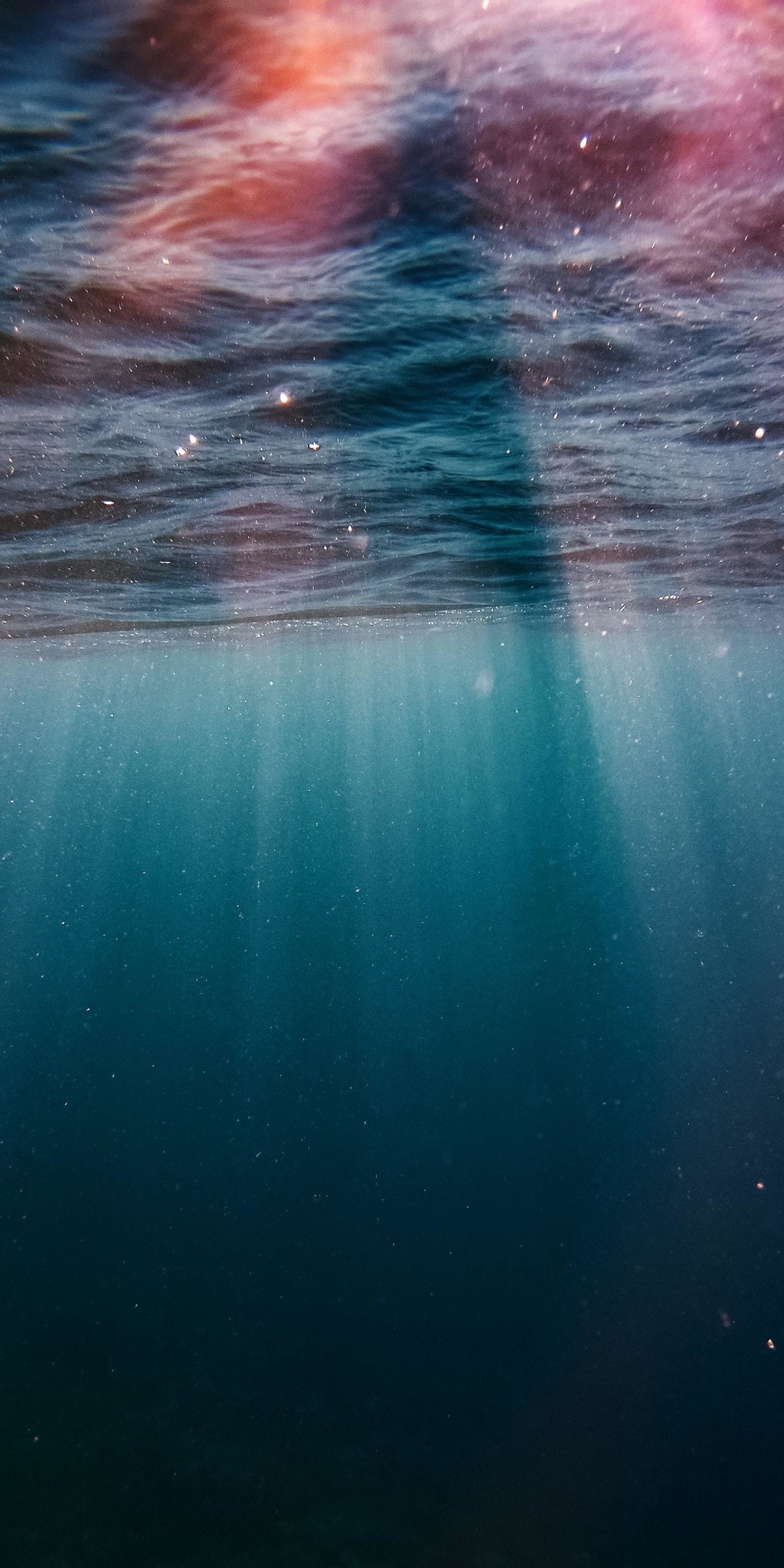 Underwater, sunrays, blue water, sea, 1080x2160 wallpaper
