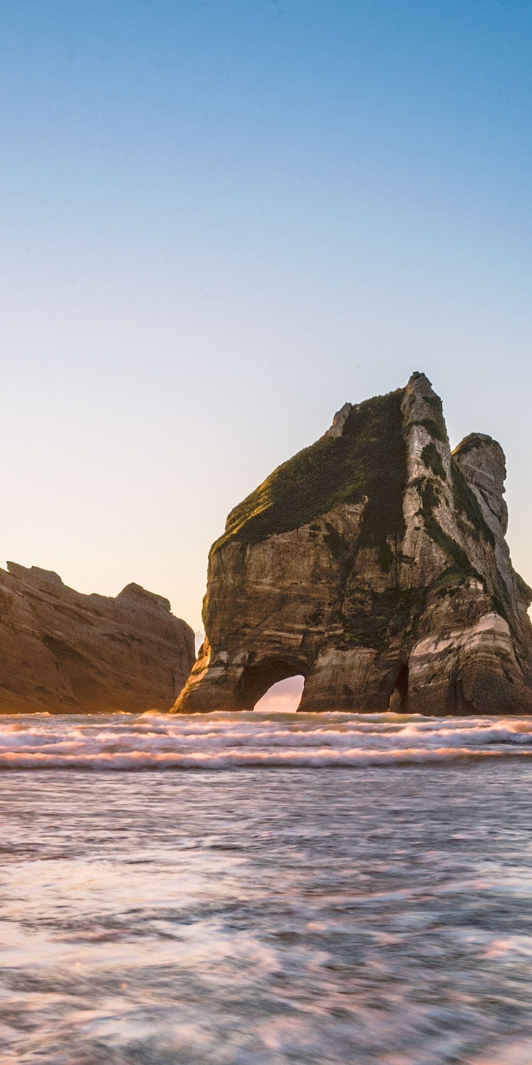 Download 1080x2160 wallpaper wharariki beach, arch, nature, sunset, honor 7x, honor 9 lite