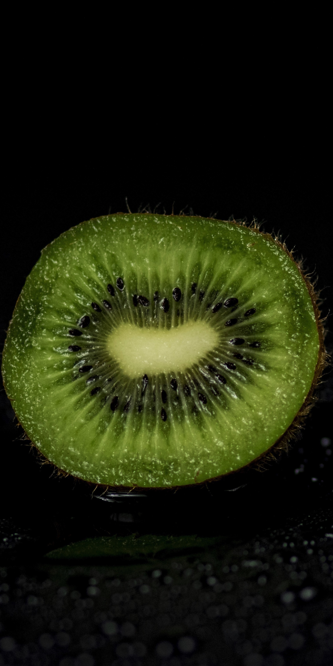 Kiwifruit, half cut, close up, 1080x2160 wallpaper