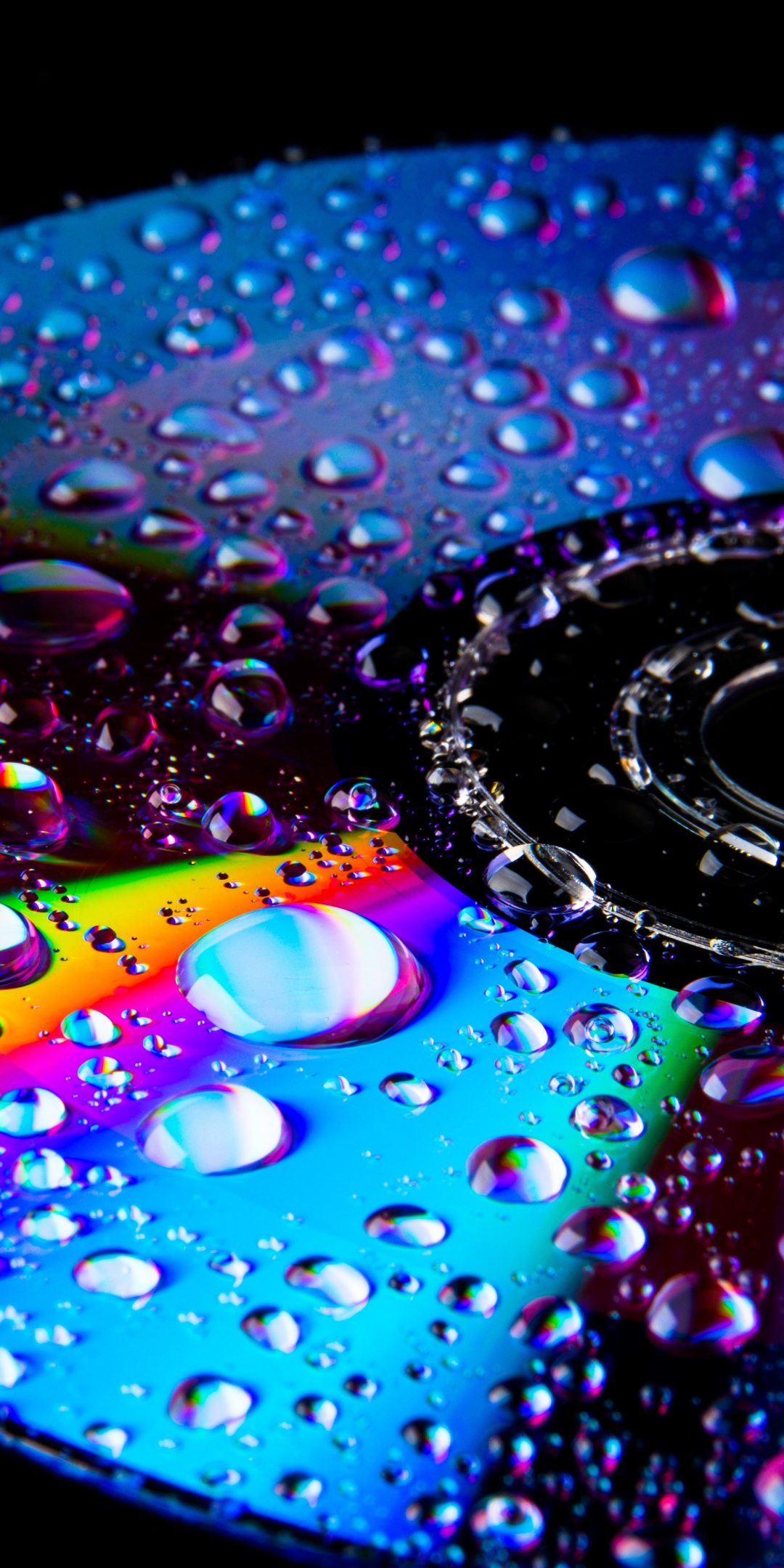 Disk, wet surface, drops, colorful, reflections, 1080x2160 wallpaper