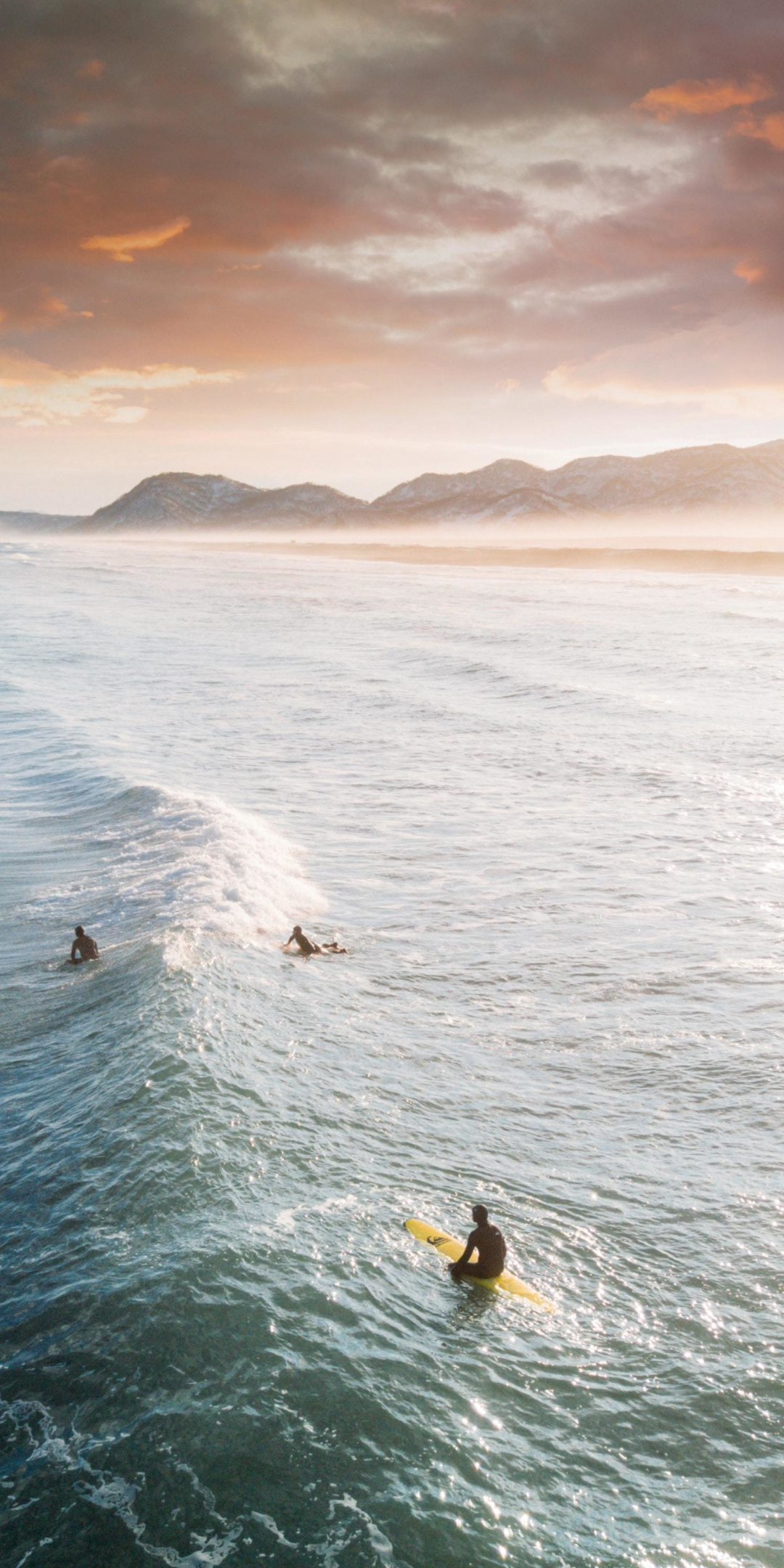 Tide, surfers, sea, aerial shot, sunset, 1080x2160 wallpaper