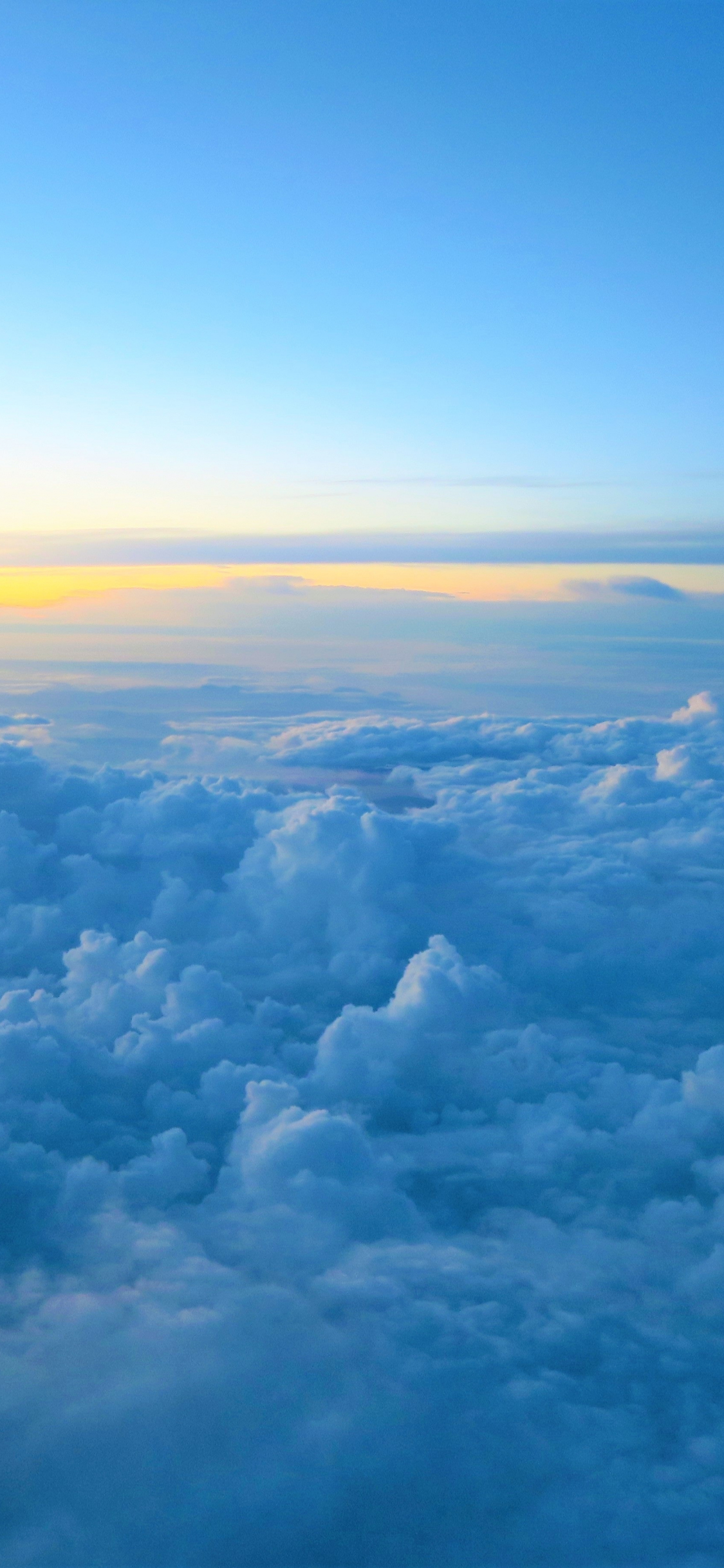 Download Clouds And Sunset Sky Sea Of Clouds 1125x2436 Wallpaper