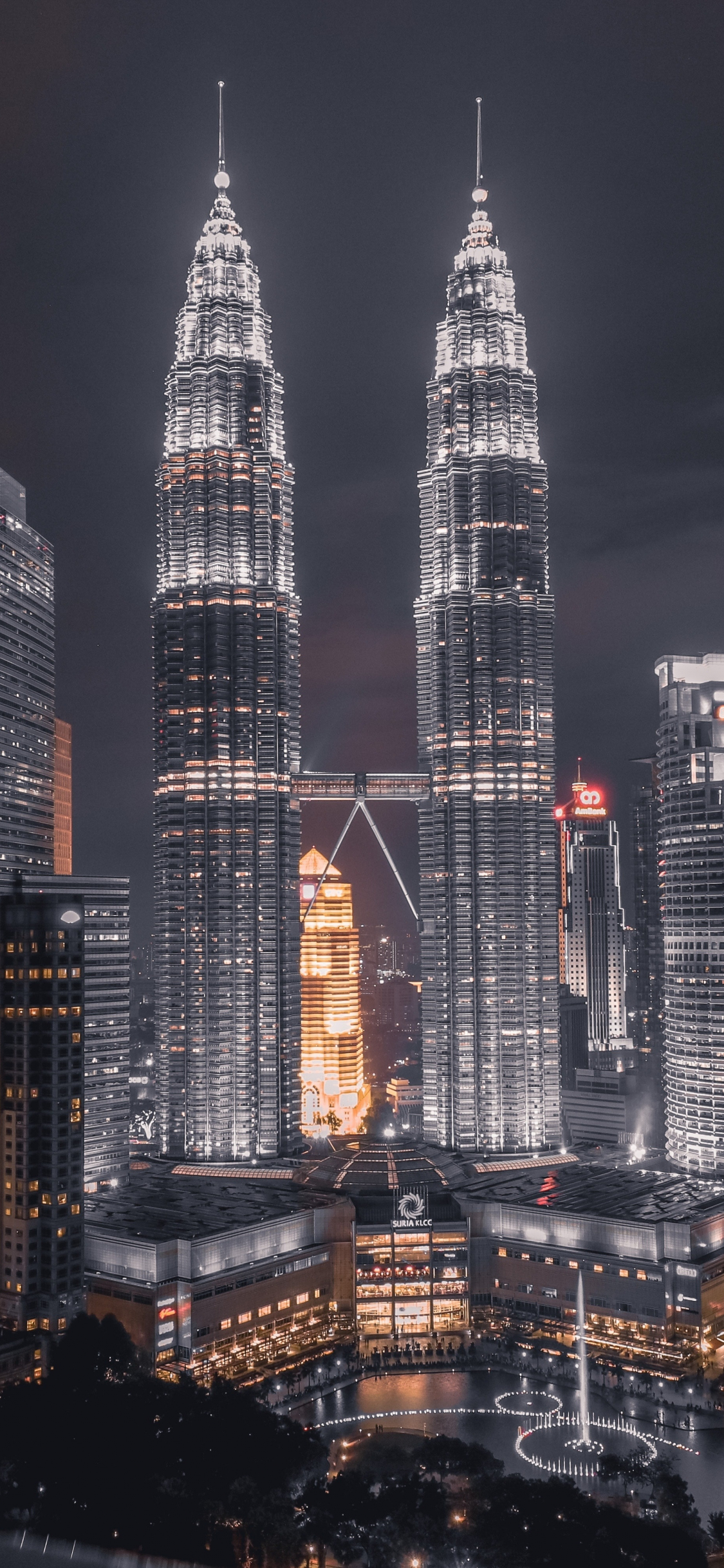 Download Nighttime View of the Kuala Lumpur Skyline Wallpaper | Wallpapers .com