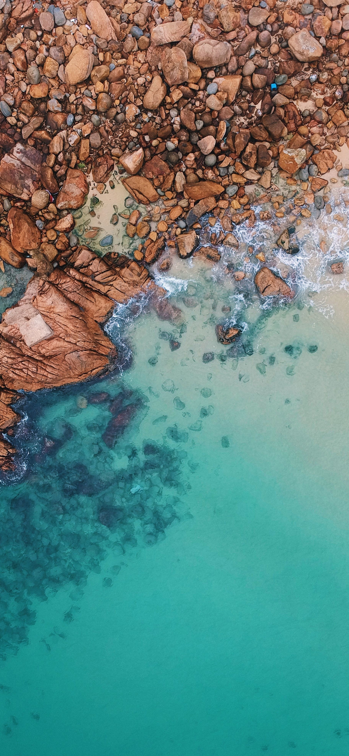 Download 1125x2436 Wallpaper Rocks Beach Aerial View Hong Kong Iphone X 1125x2436 Hd Image Background 19514