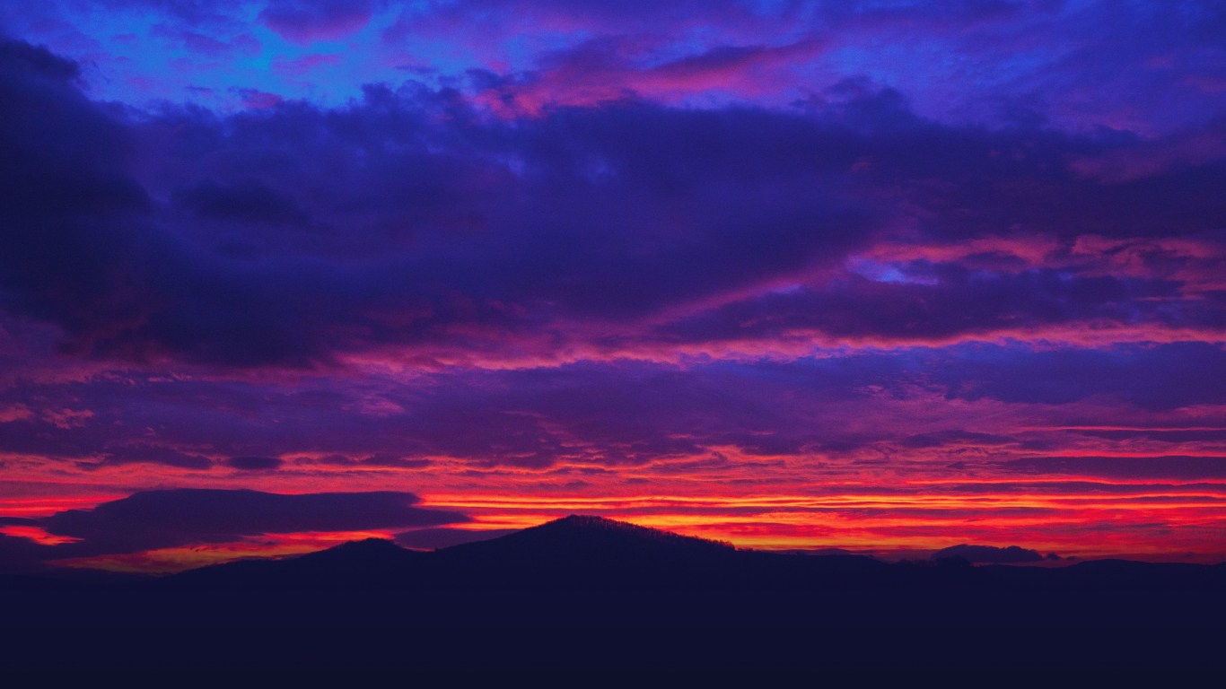 Download wallpaper 1366x768 mountains, sunset, sky, clouds, tablet ...