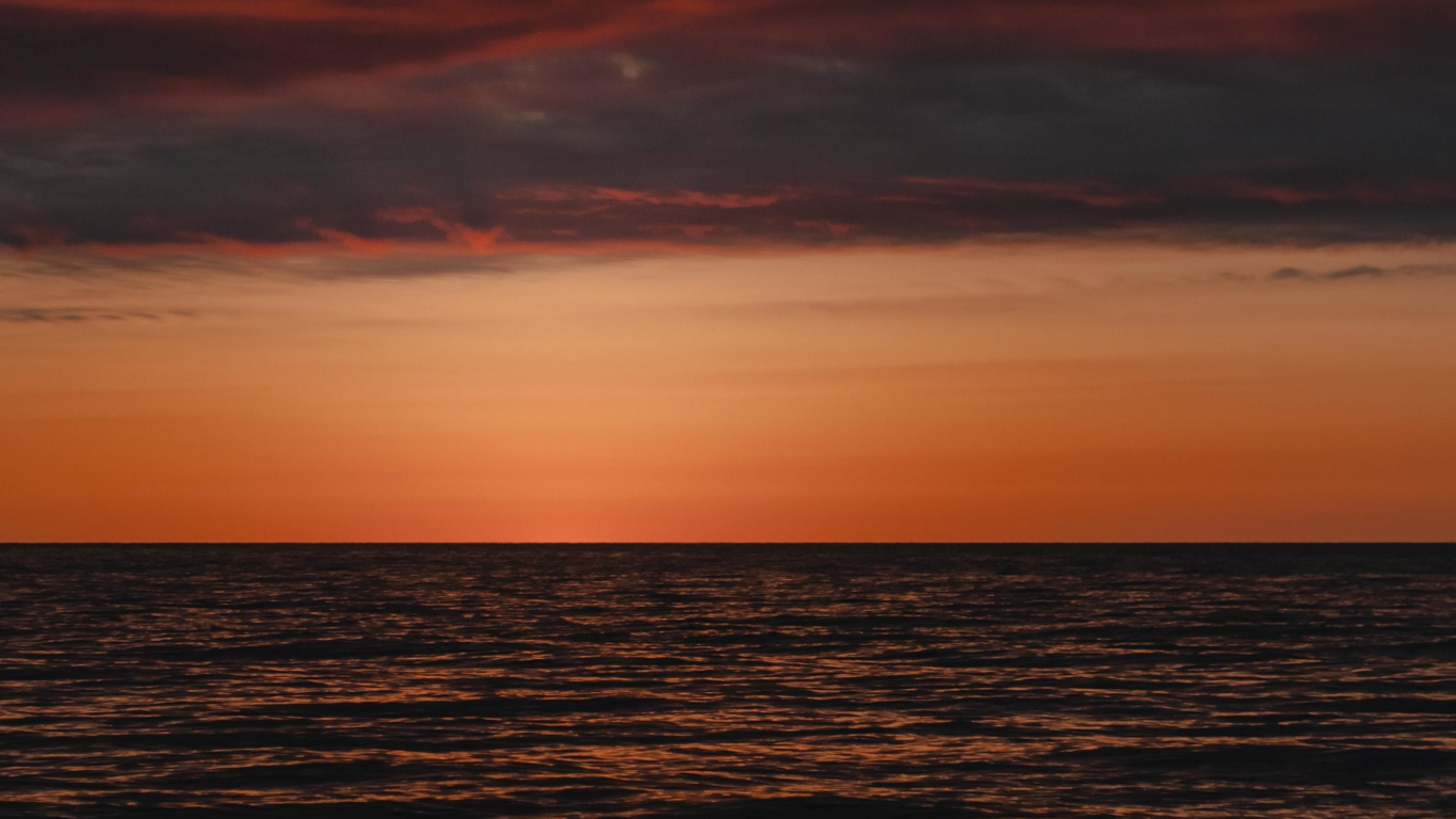 Download 1366x768 wallpaper calm sunset, seascape, sea ...