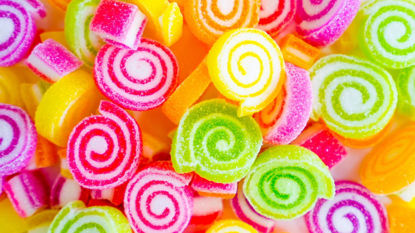 Download wallpaper 1366x768 colorful, candies, sweet rolles, tablet, laptop,  1366x768 hd background, 7291