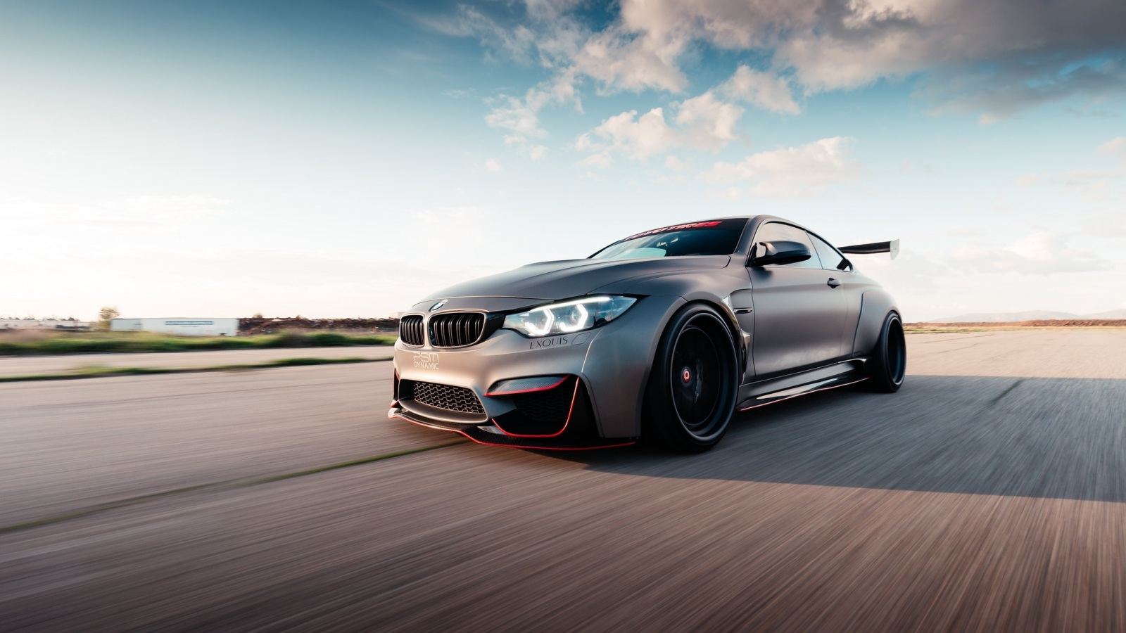 Download 1600x900 Wallpaper Bmw M4 On Road Luxurious Car Widescreen 16 9 Widescreen 1600x900 Hd Image Background 20996