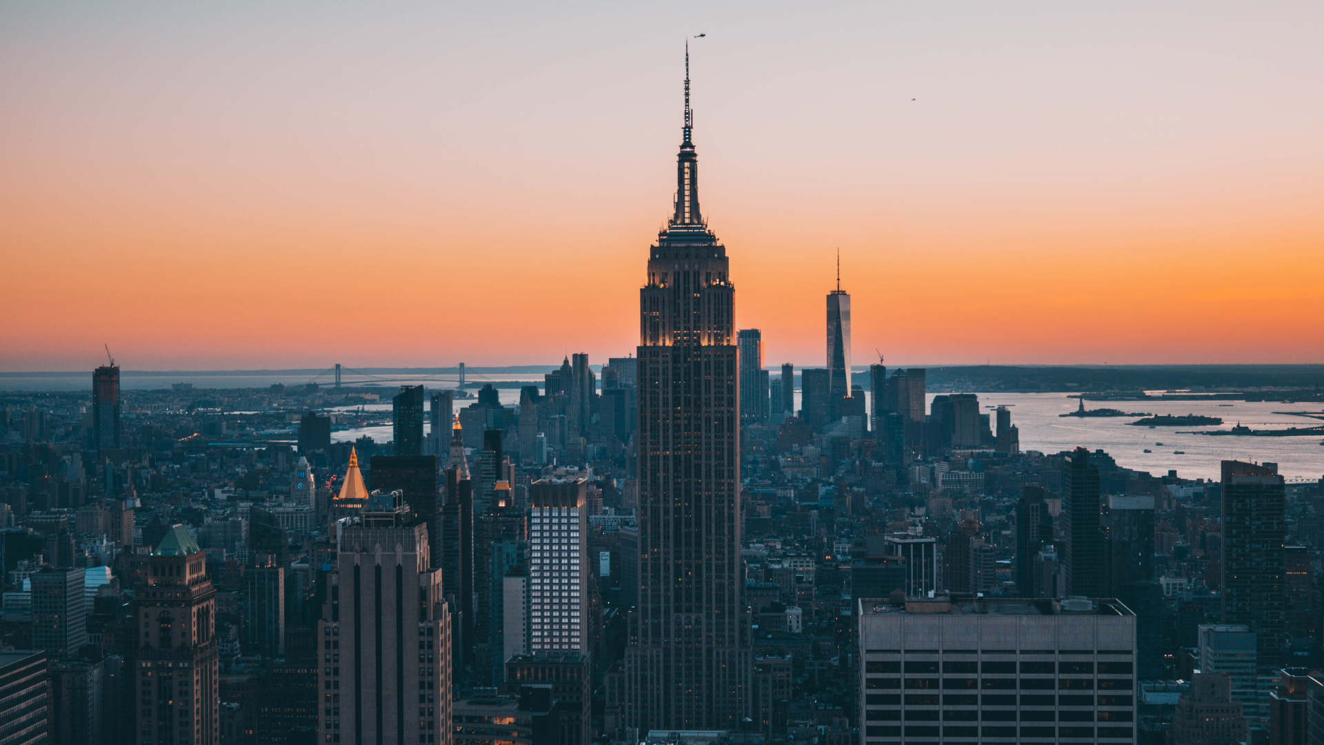 Download 1920x1080 wallpaper empire state building, buildings, sunset