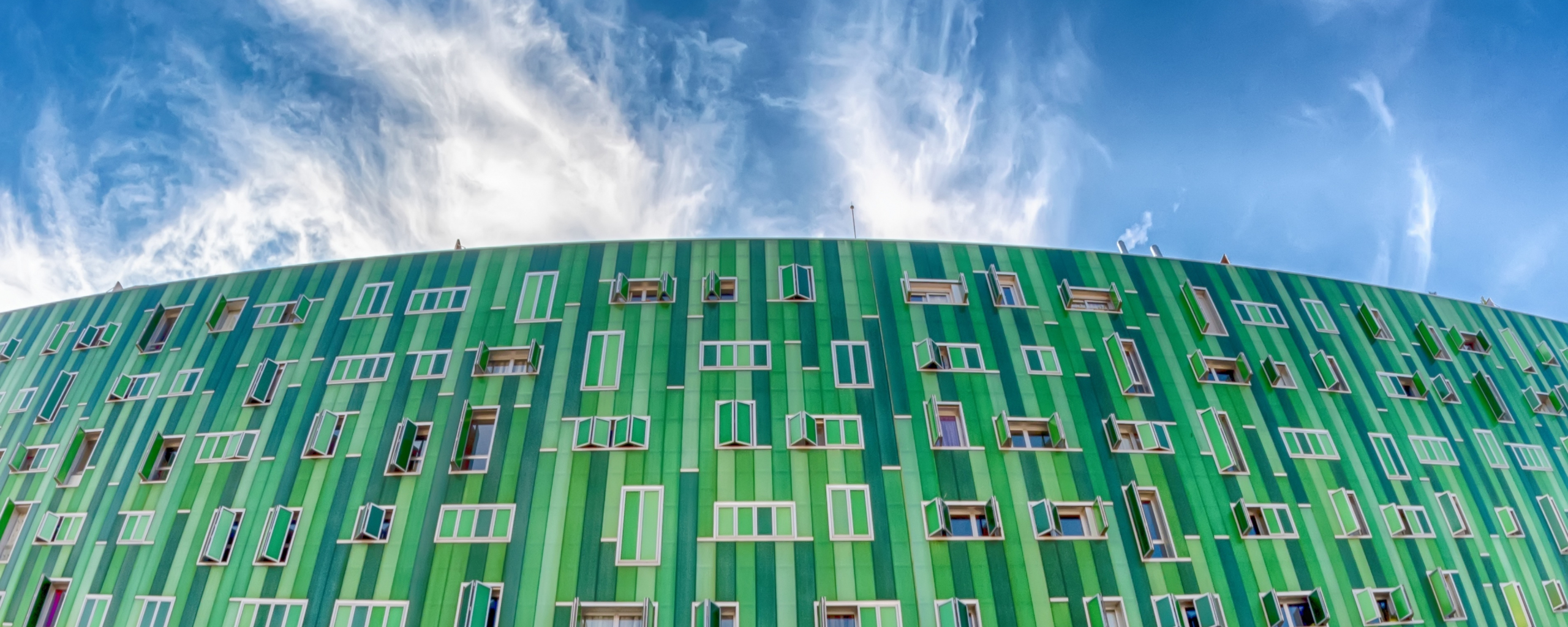 Download wallpaper 2560x1024 green, facade, sunny day, building ...
