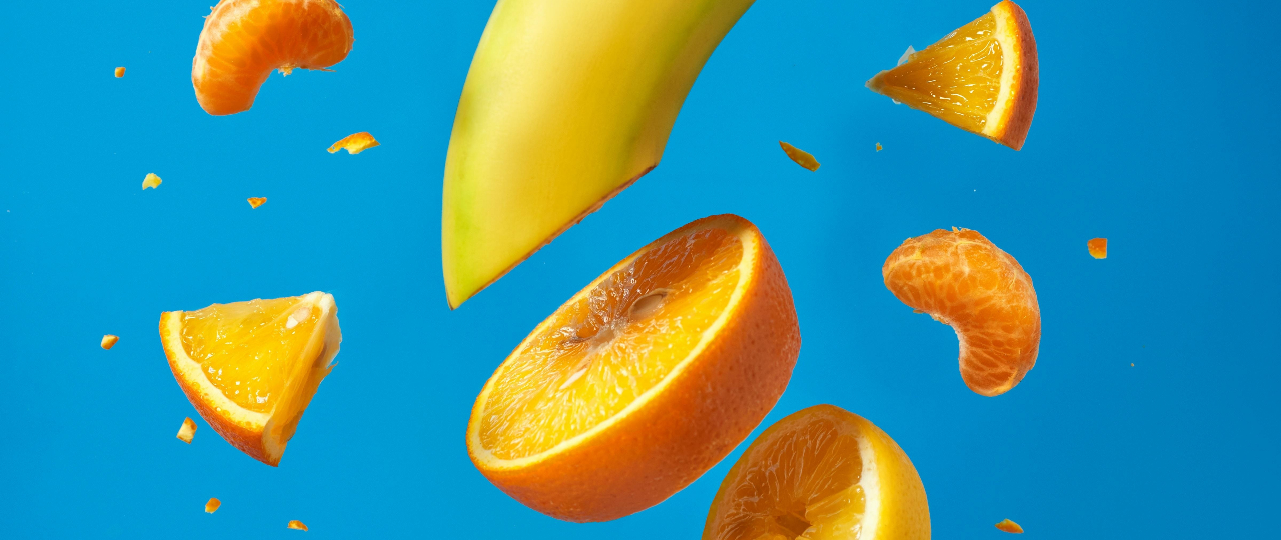 Download wallpaper 2560x1080 banana-orange fruit slices, close up, dual ...