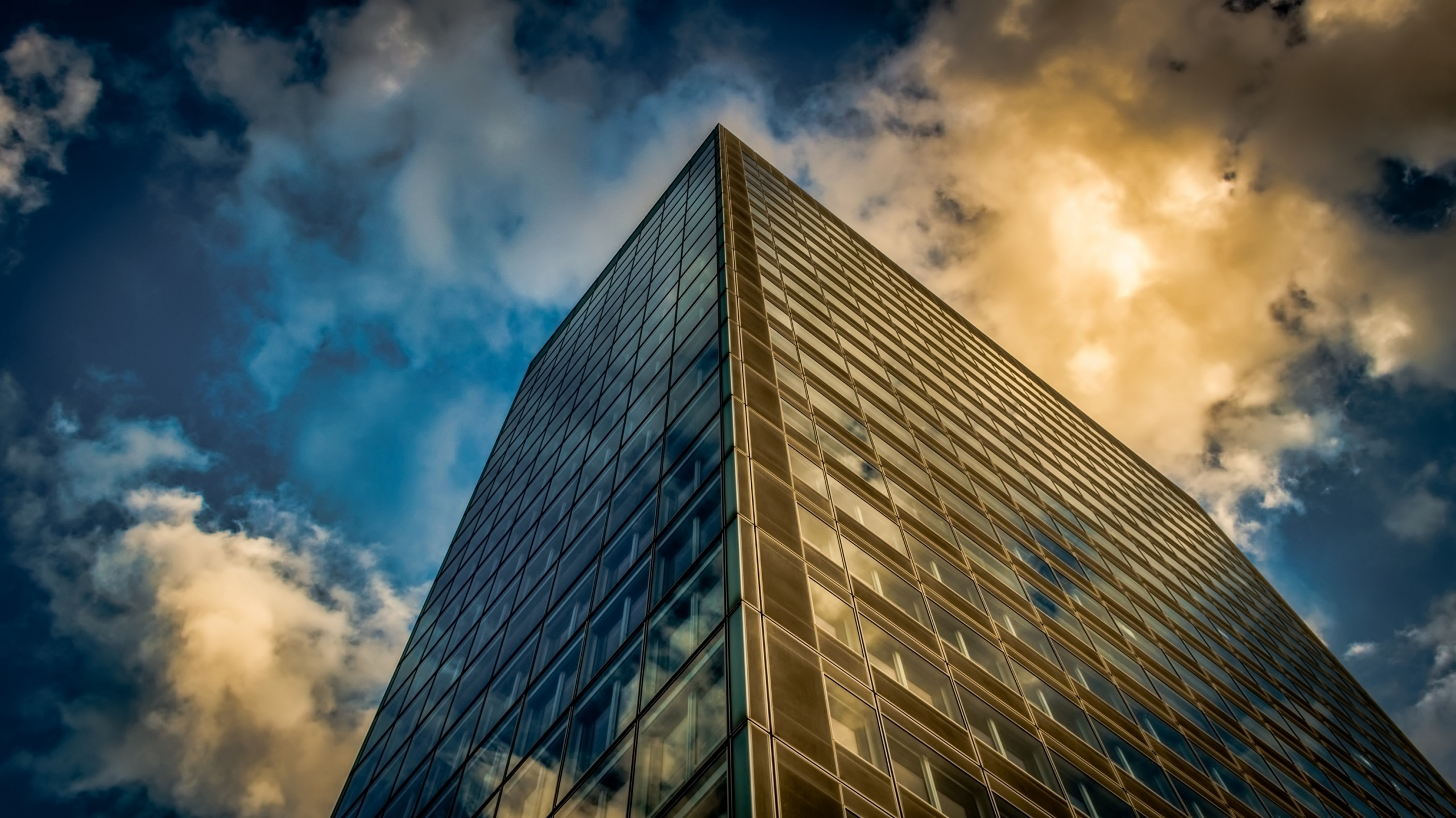 Download 2560x1440 wallpaper modern architecture, building, clouds, sky