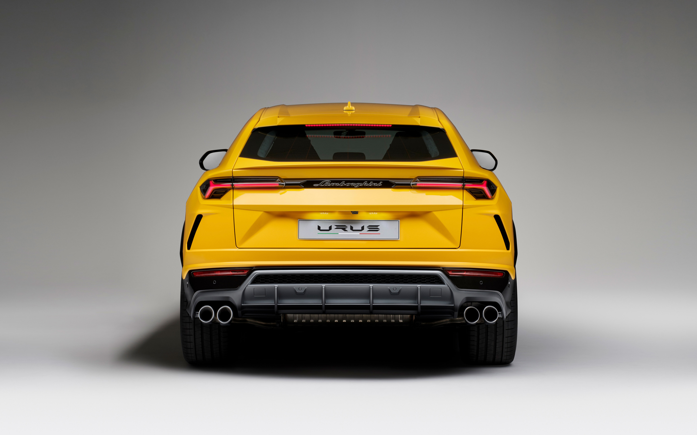 Lamborghini urus, yellow car, rear view, 2880x1800 wallpaper