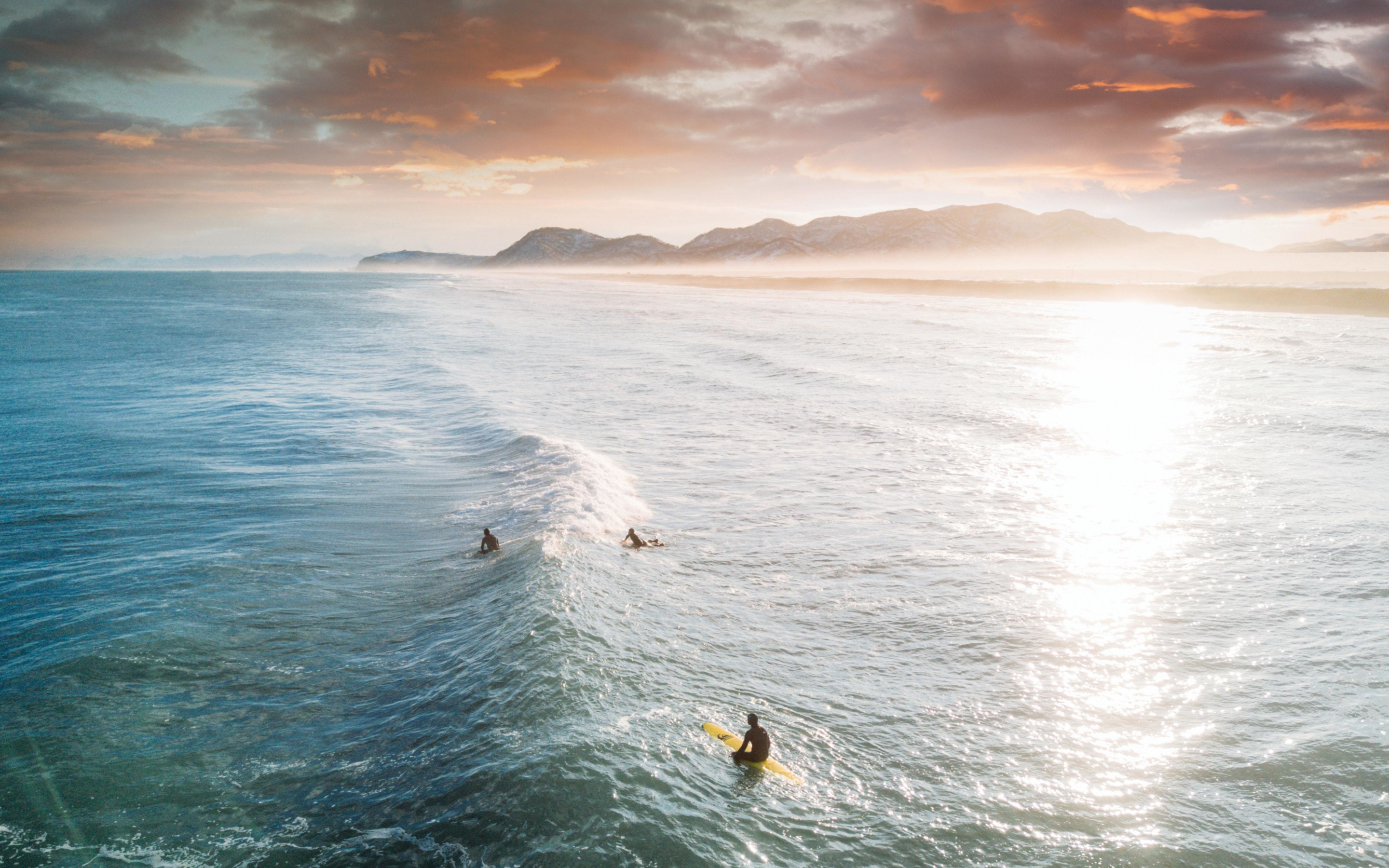 Tide, surfers, sea, aerial shot, sunset, 2880x1800 wallpaper