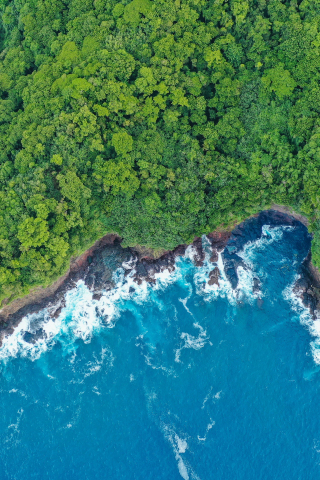 Coast, island, ocean waves collision, aerial view, 240x320 wallpaper
