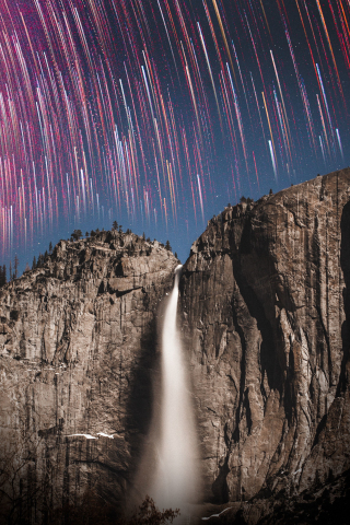 Star trails, rock cliff waterfall, 240x320 wallpaper