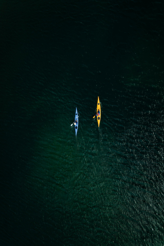 Download wallpaper 240x320 drone view, two boat surfing, sea, old