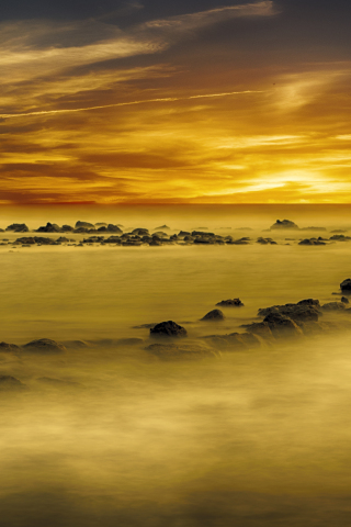 Yellow, sunset, coast, rocks, 240x320 wallpaper
