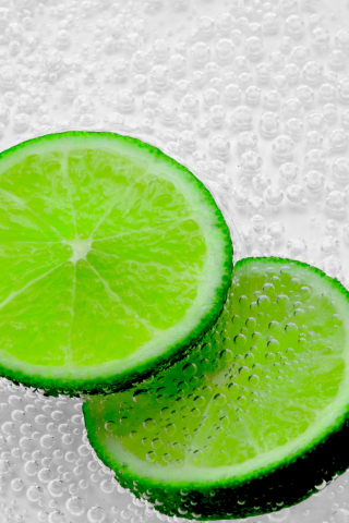 Green lemon slices, bubbles, close up, 240x320 wallpaper