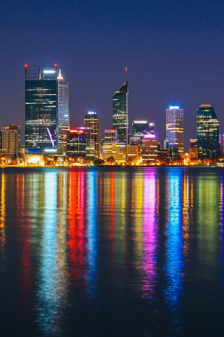 Cityscape, buildings, colorful, reflections, night, 240x320 wallpaper