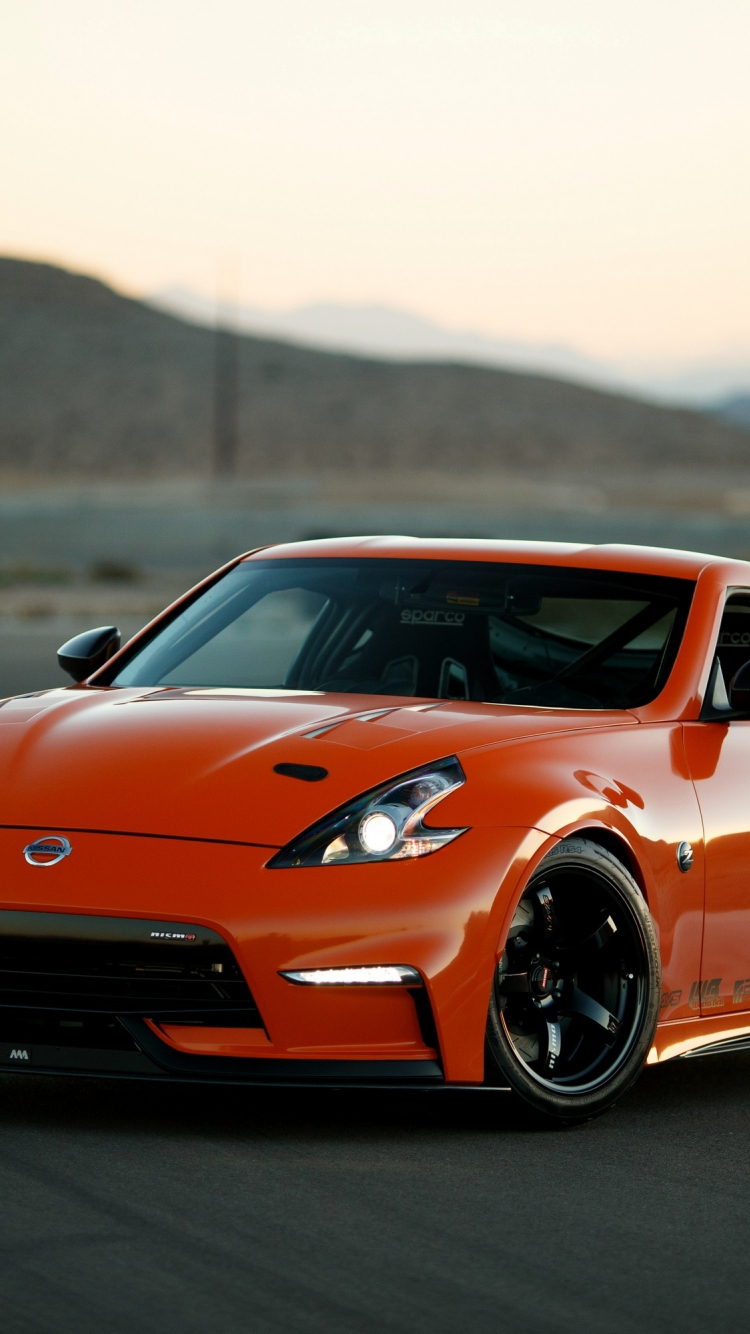 Download 750x1334 Wallpaper Car Front Nissan 370z Nismo Iphone 7