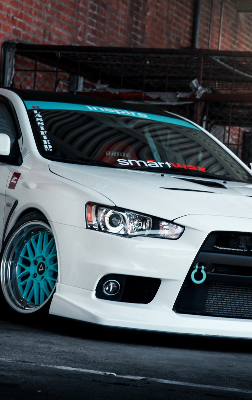 https://wallpapersmug.com/download/840x1336/a114ef/mitsubishi-sports-car.jpg