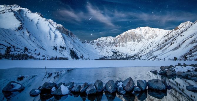 Snowy mountains, starry night, lake, rocks wallpaper