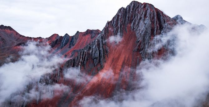 Red mountains, behind the clouds, Cusco, Peru wallpaper
