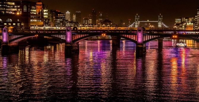 City, night at bridge, colorful glow on water wallpaper