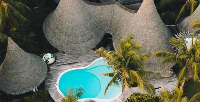 Resort huts, pool, aerial shot wallpaper