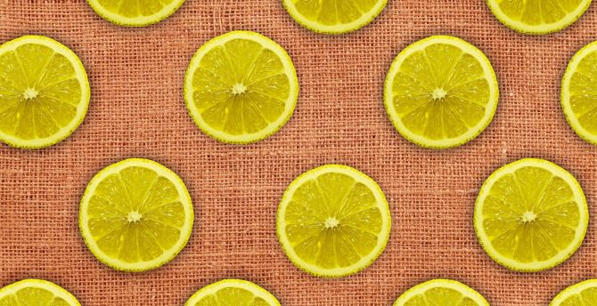 Lemons, slices, yellow wallpaper
