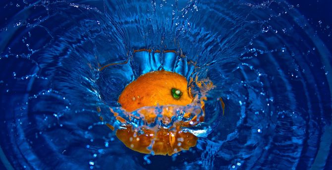 Orange fruit, splashes, water wallpaper