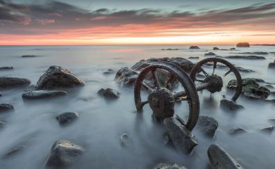 Sunrise, old wheels, coast rocks, adorable