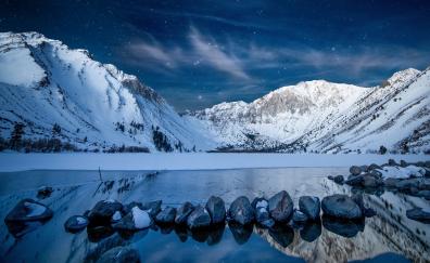 Snowy mountains, starry night, lake, rocks