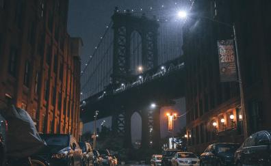 Sidewalk near bridge, city, night