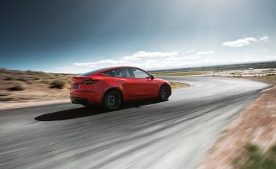 Motion blur, Red Tesla Model Y, on-road
