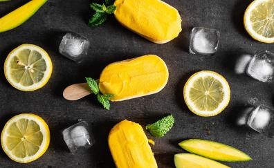 Summer, yellow ice candy, ice cubes, lemon slices