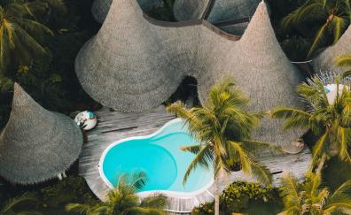 Resort huts, pool, aerial shot