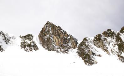 Rocky cliffs, winter, snow layers