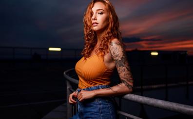 Woman with tattoo, redhead