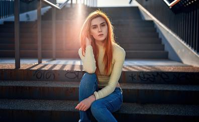Girl in casual outfit, sitting at stairs, beautiful