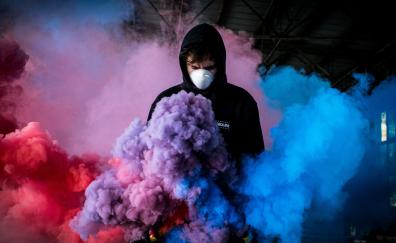 Colorful smoke, man in mask