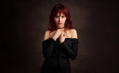 A redhead girl in black dress, pretty woman